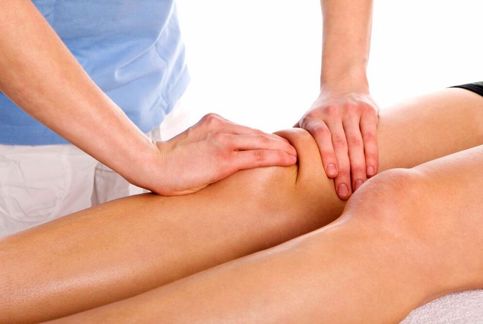 Therapeutic massage session for injured knee